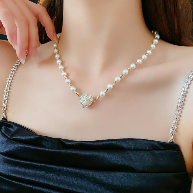 💖 Le cadeau parfait pour l'amour et l'élégance - Collier de perles en forme de cœur magnétique 💖 