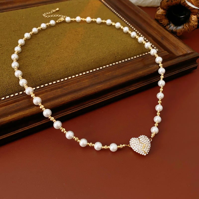 💖 Le cadeau parfait pour l'amour et l'élégance - Collier de perles en forme de cœur magnétique 💖 